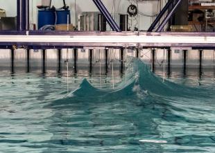 Breaking waves being made in the FloWave Tank